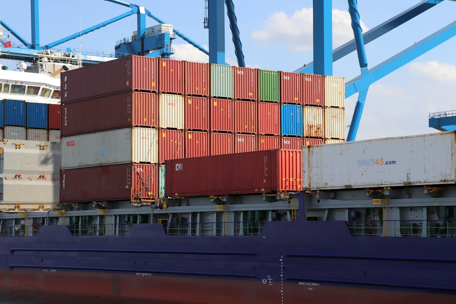 Container ship carrying stacked cargo containers